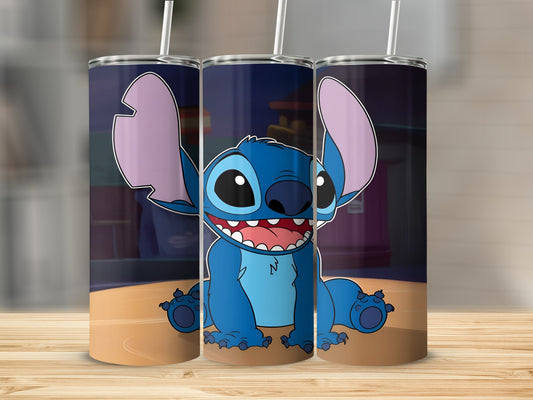 Blue Stitch character from Lilo & Stitch sitting on a wooden surface.