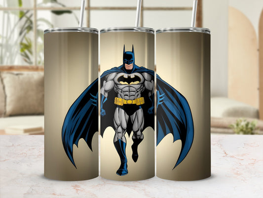 Batman illustration on a gold tumbler with a straw.