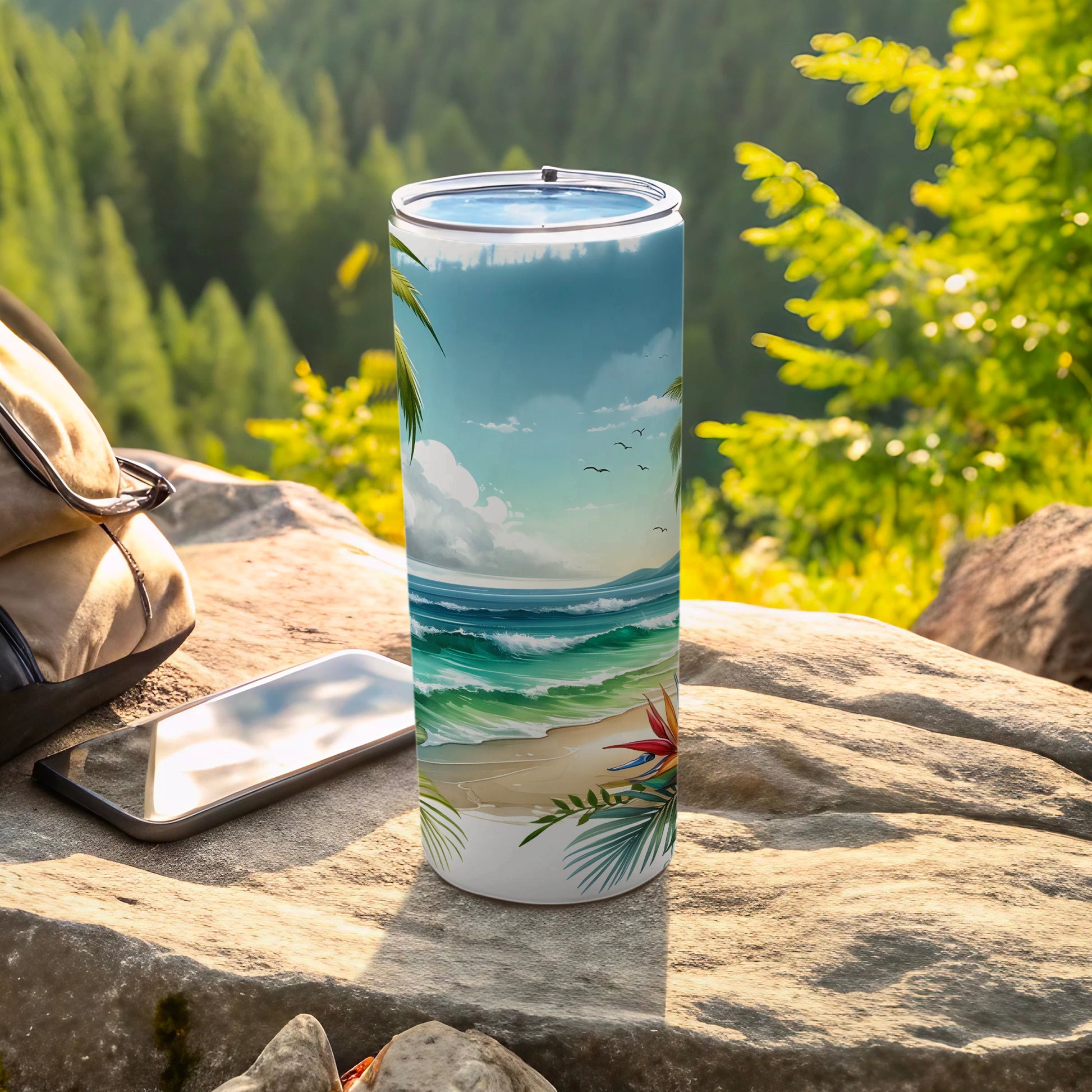 Tropical beach scene tumbler with palm trees, waves, and a bird of paradise flower.