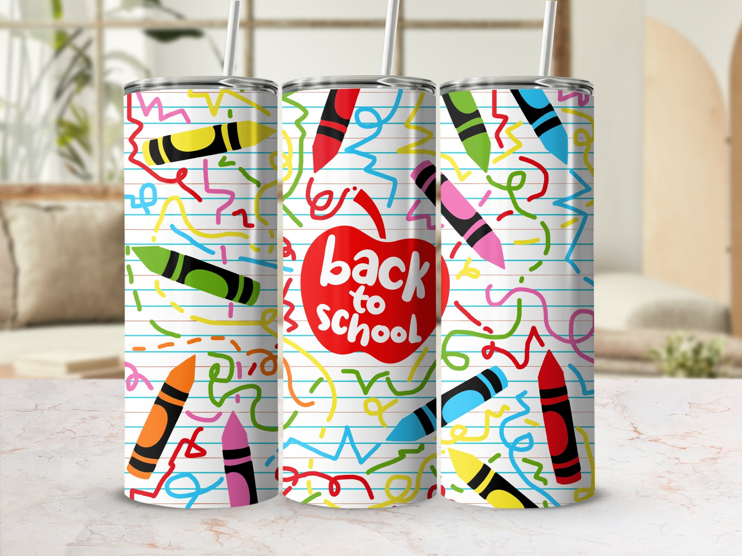 Three tumblers with a "back to school" design featuring crayons and colorful scribbles.