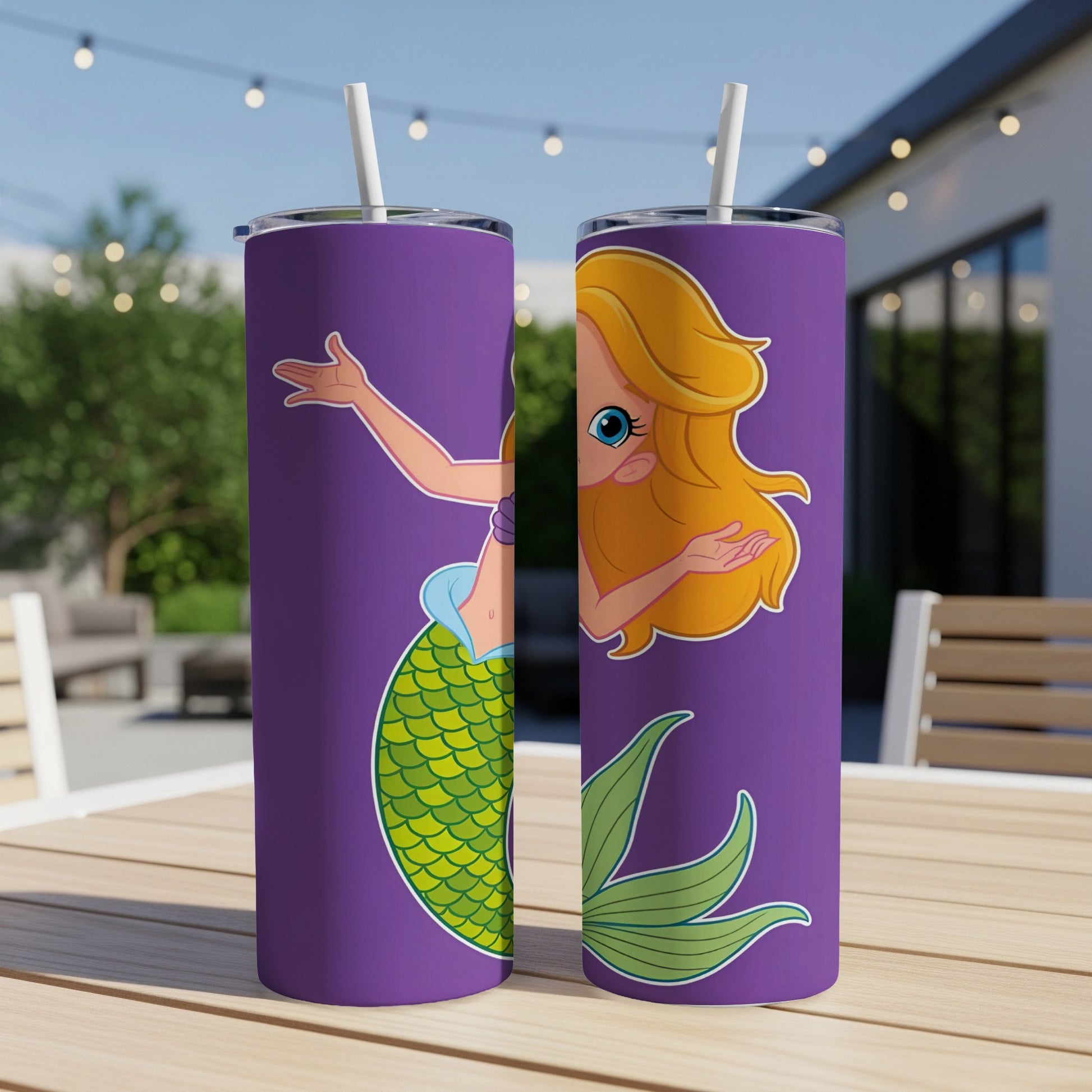 Purple tumbler with cartoon mermaid illustration.
