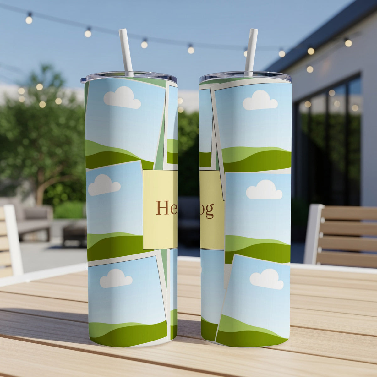 Two tall tumblers with a collage of rolling green hills and blue skies.