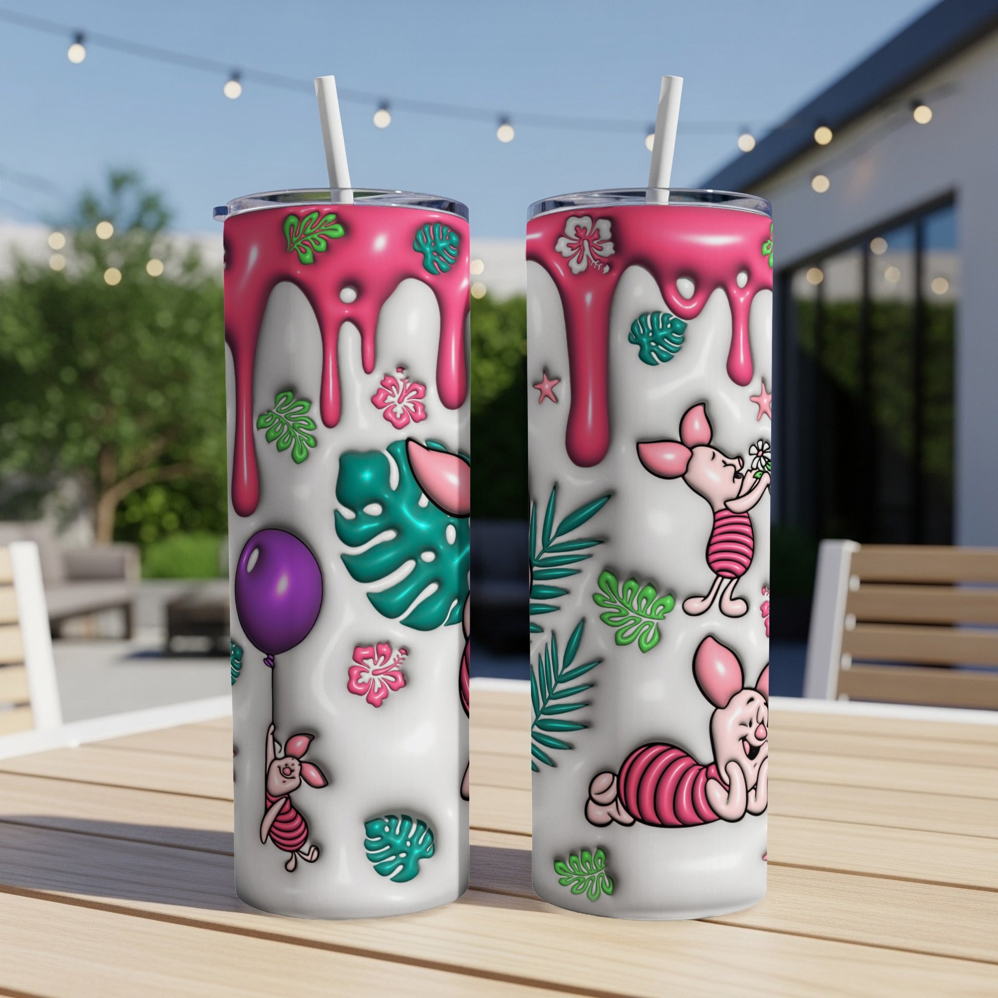 Two tumblers featuring Winnie the Pooh and tropical leaves.