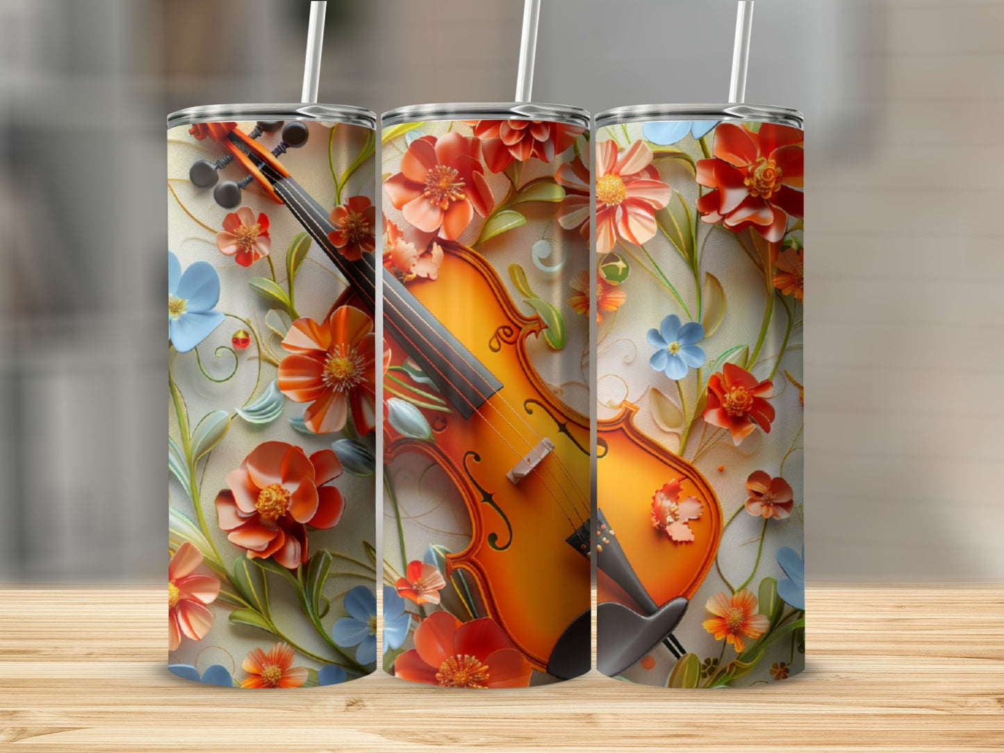 Tumbler with floral violin design featuring orange and blue flowers.