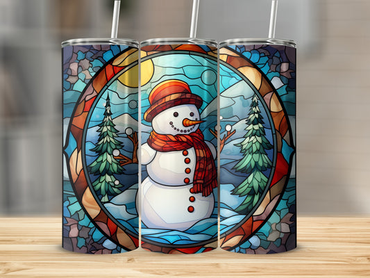 Stained glass tumbler featuring a snowman, pine trees, and winter landscape.