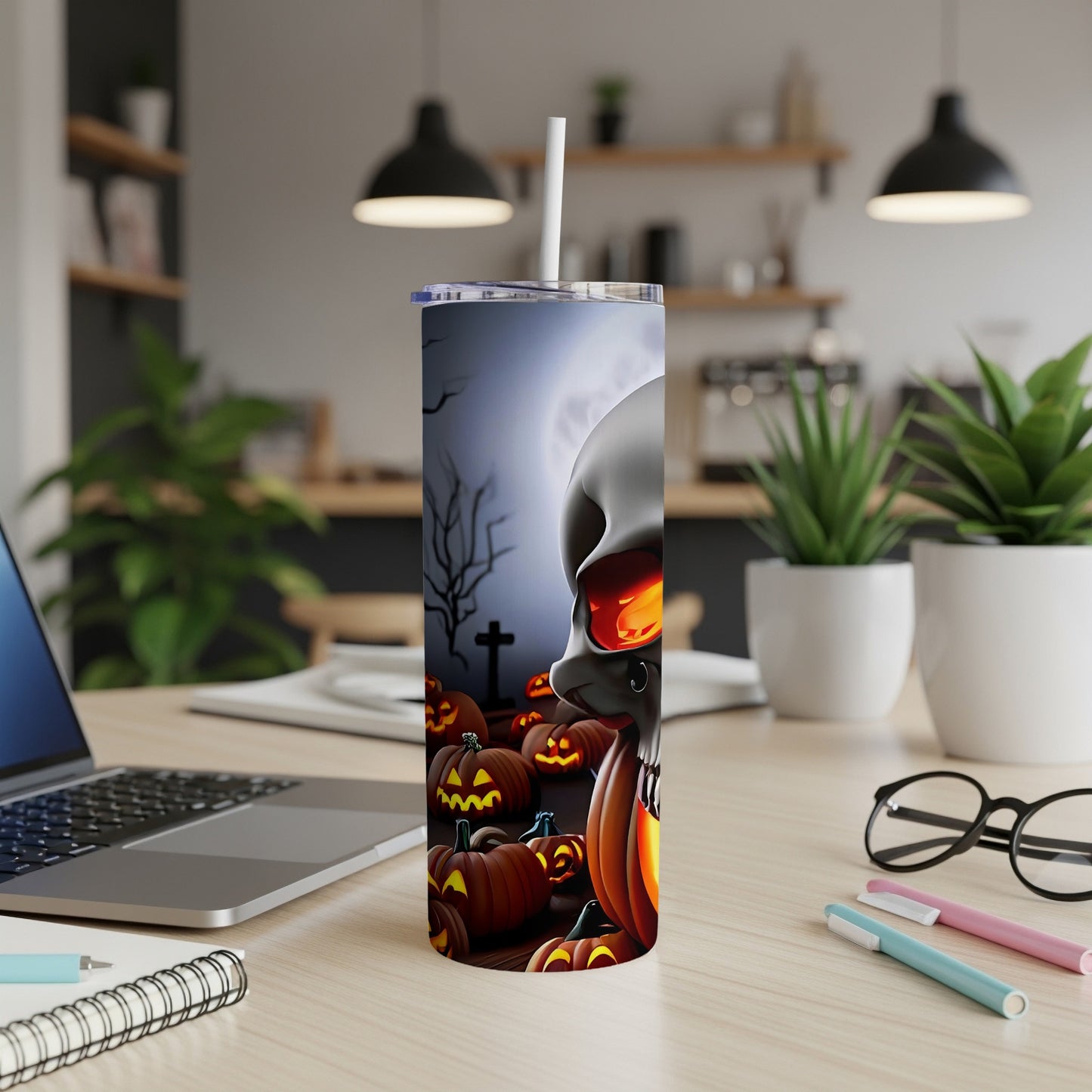 Tumbler with Halloween skull and jack-o'-lanterns design.