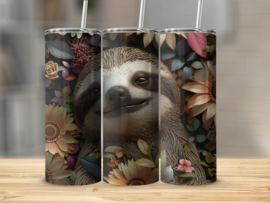 Sloth surrounded by flowers on a tall skinny tumbler.