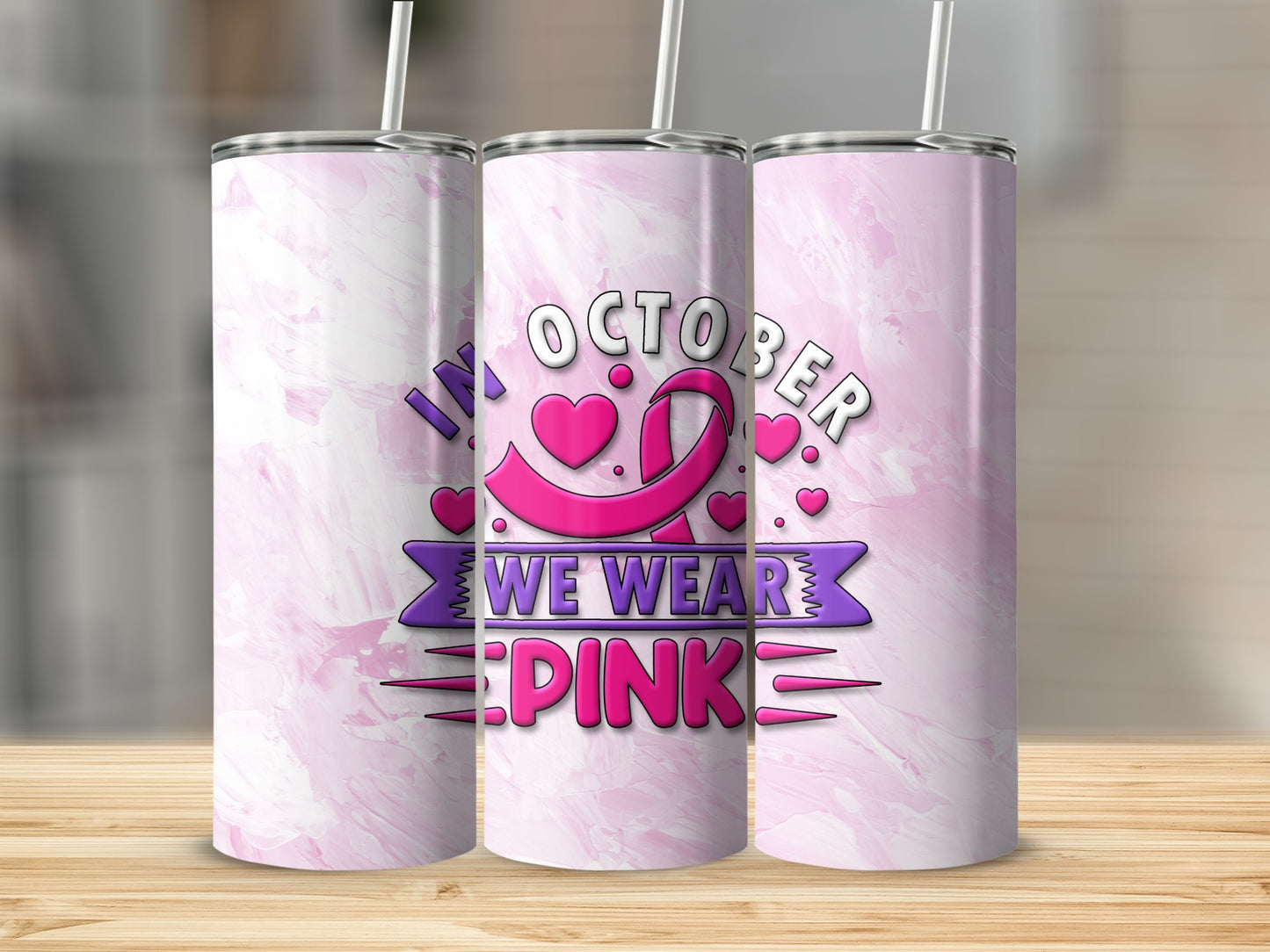 Pink marble tumbler with "In October We Wear Pink" text and breast cancer ribbon.