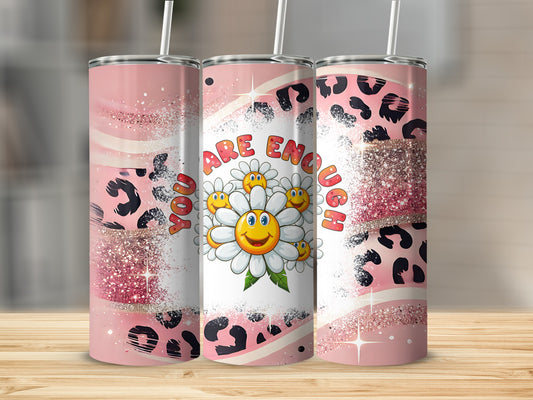 Pink tumbler with leopard print and "you are enough" text.
