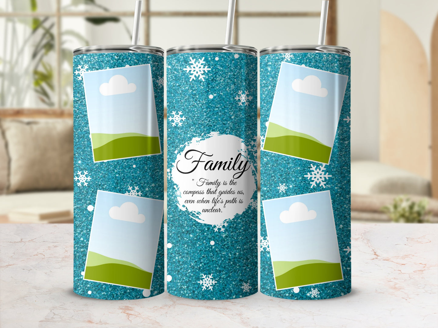 Three tumblers with glittery blue backgrounds, snowflakes, and framed landscape photos.