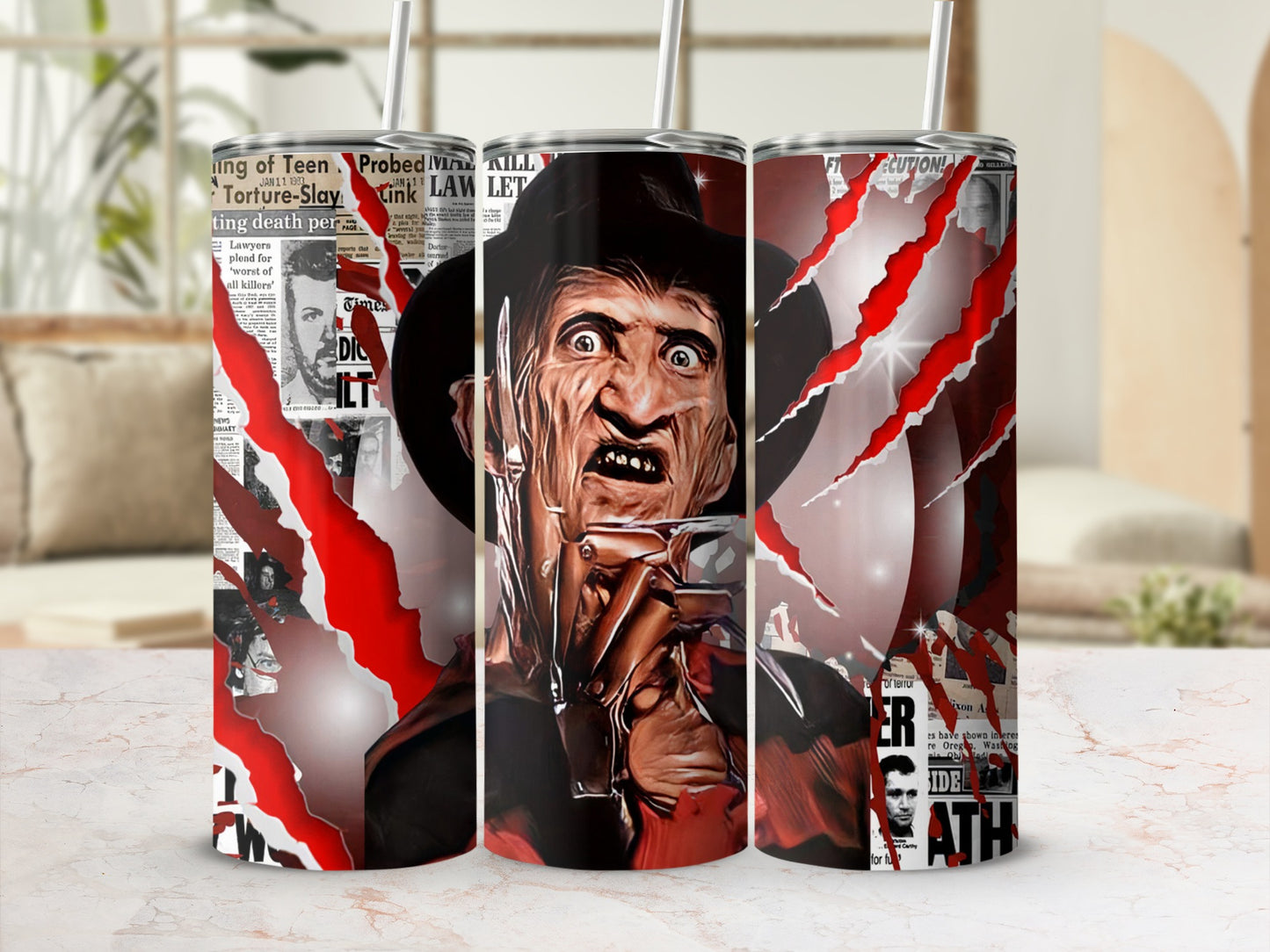 Three tumblers with a horror theme featuring Freddy Krueger and torn newspaper print.