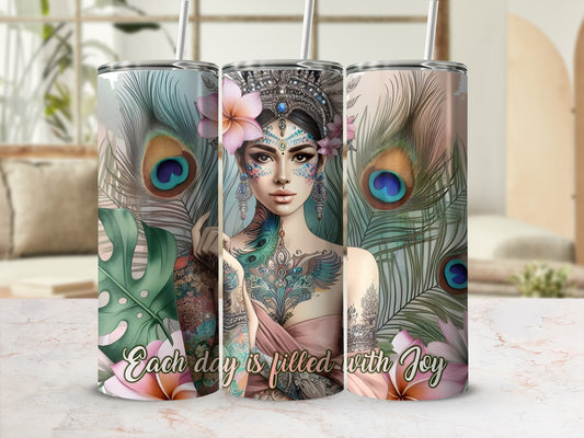 Tumbler featuring a tattooed woman with peacock feathers and the text "Each day is filled with Joy".