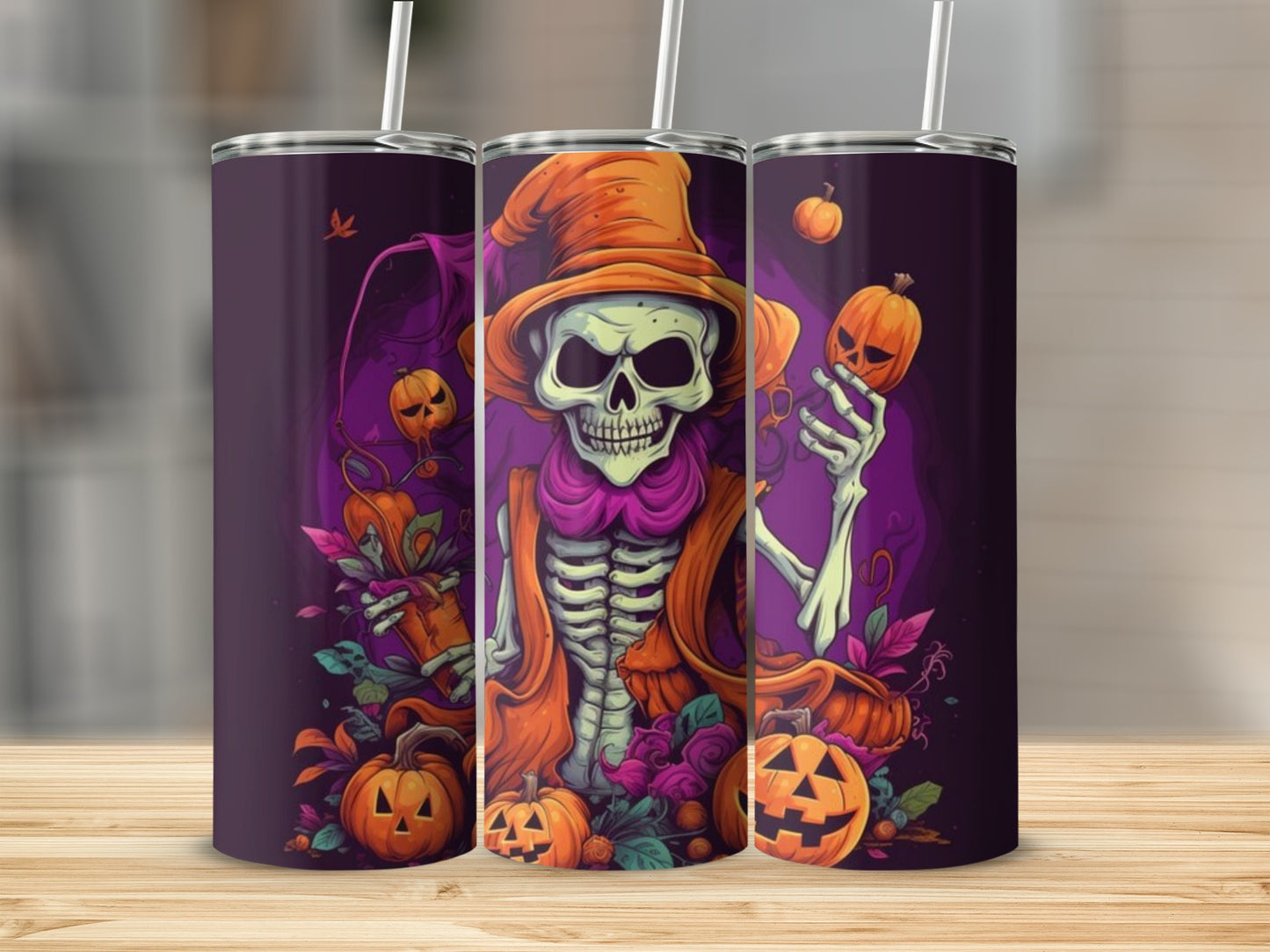 Three tumblers with a spooky skeleton wearing a witch hat and holding pumpkins.