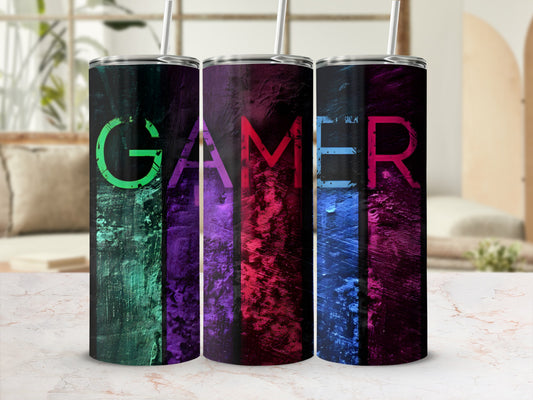 Three tumblers with "GAMER" text in colorful, distressed lettering.