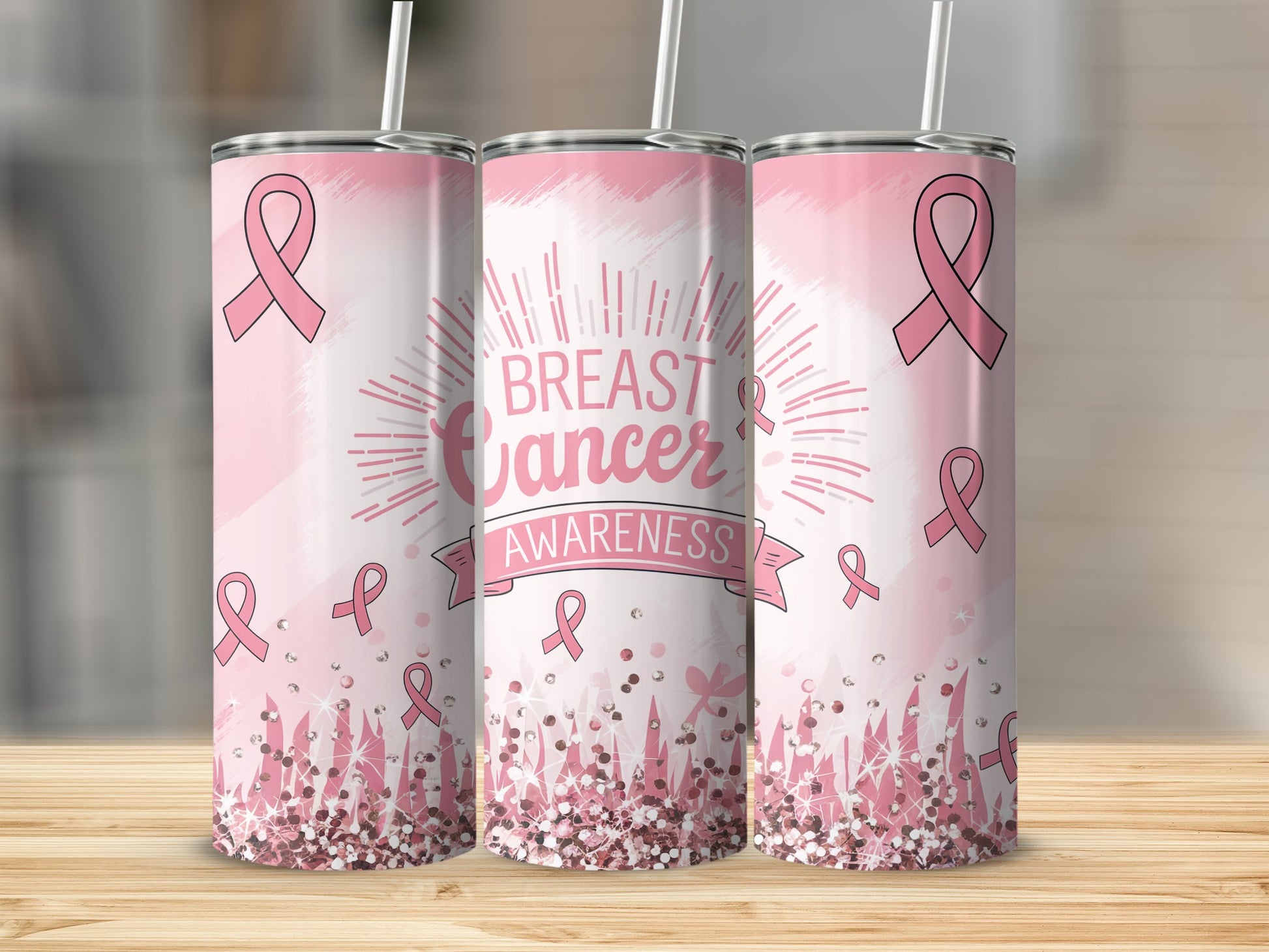Pink breast cancer awareness tumblers with glitter and ribbons.
