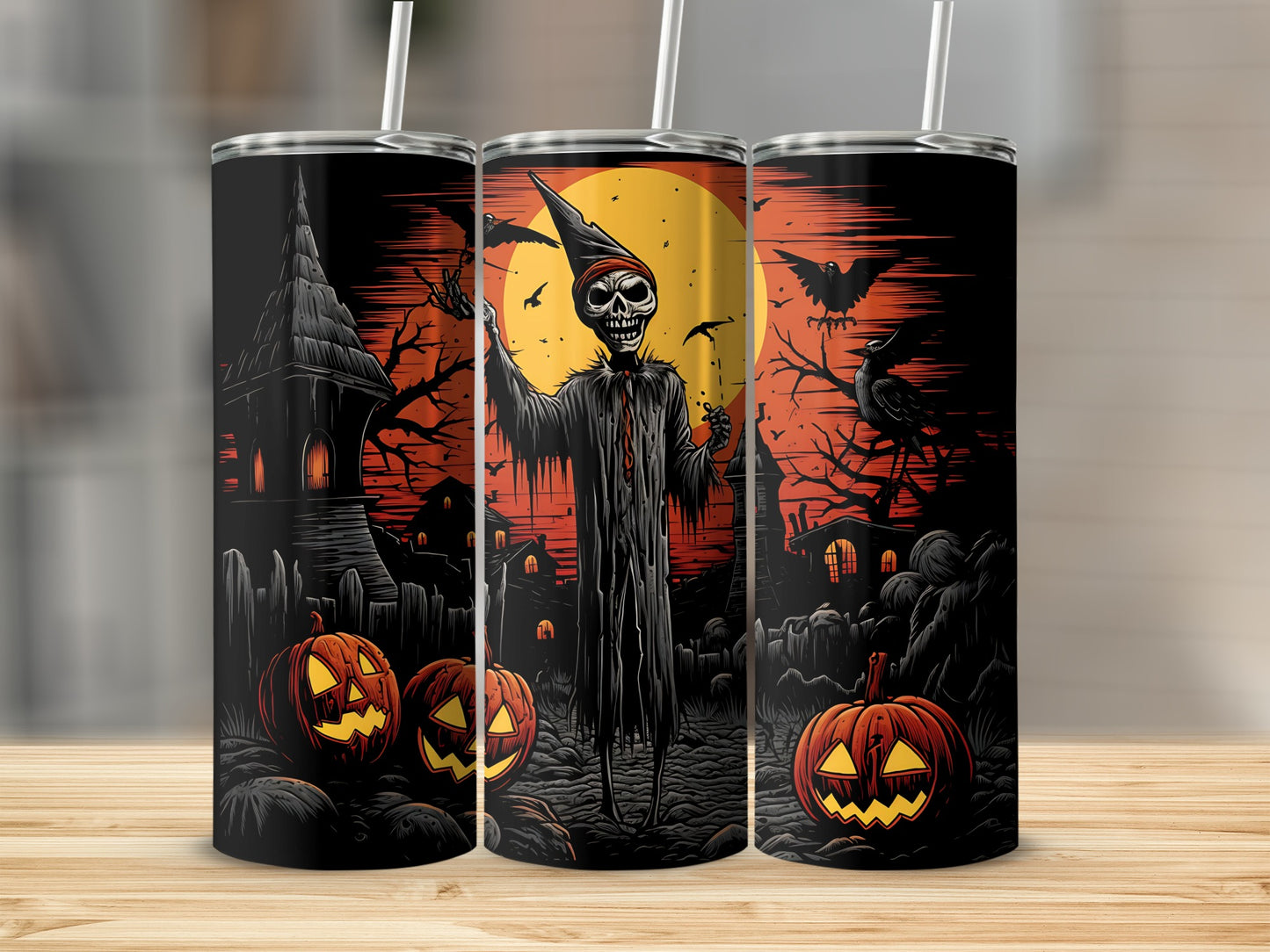 Three tumblers with a spooky Halloween scene featuring a skeleton, pumpkins, and a haunted house.