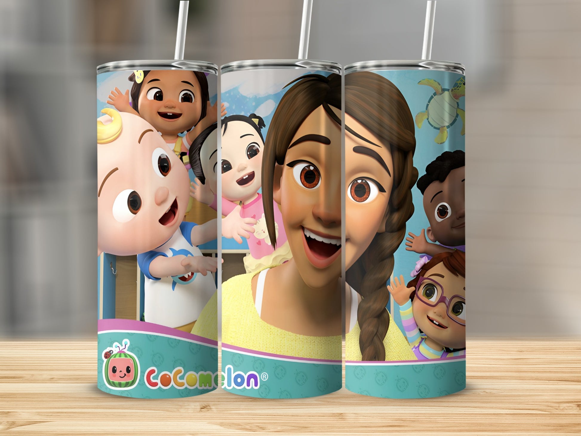 Cocomelon characters on a tumbler with straw.