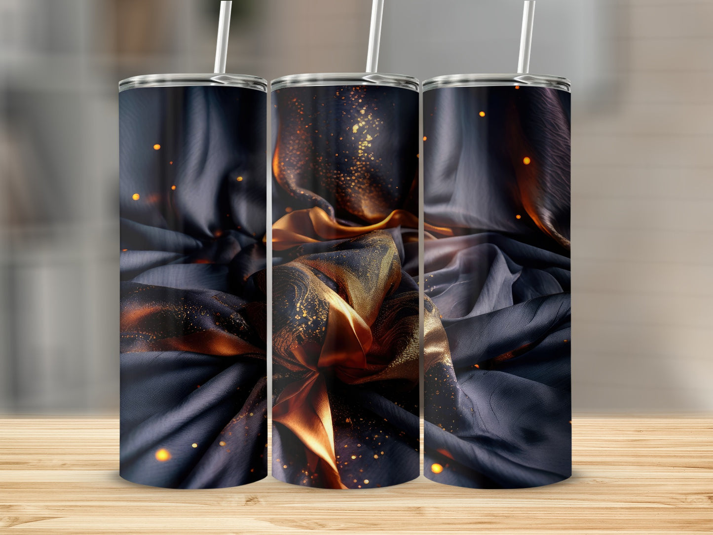 Three tumblers featuring abstract gold and black fabric design.