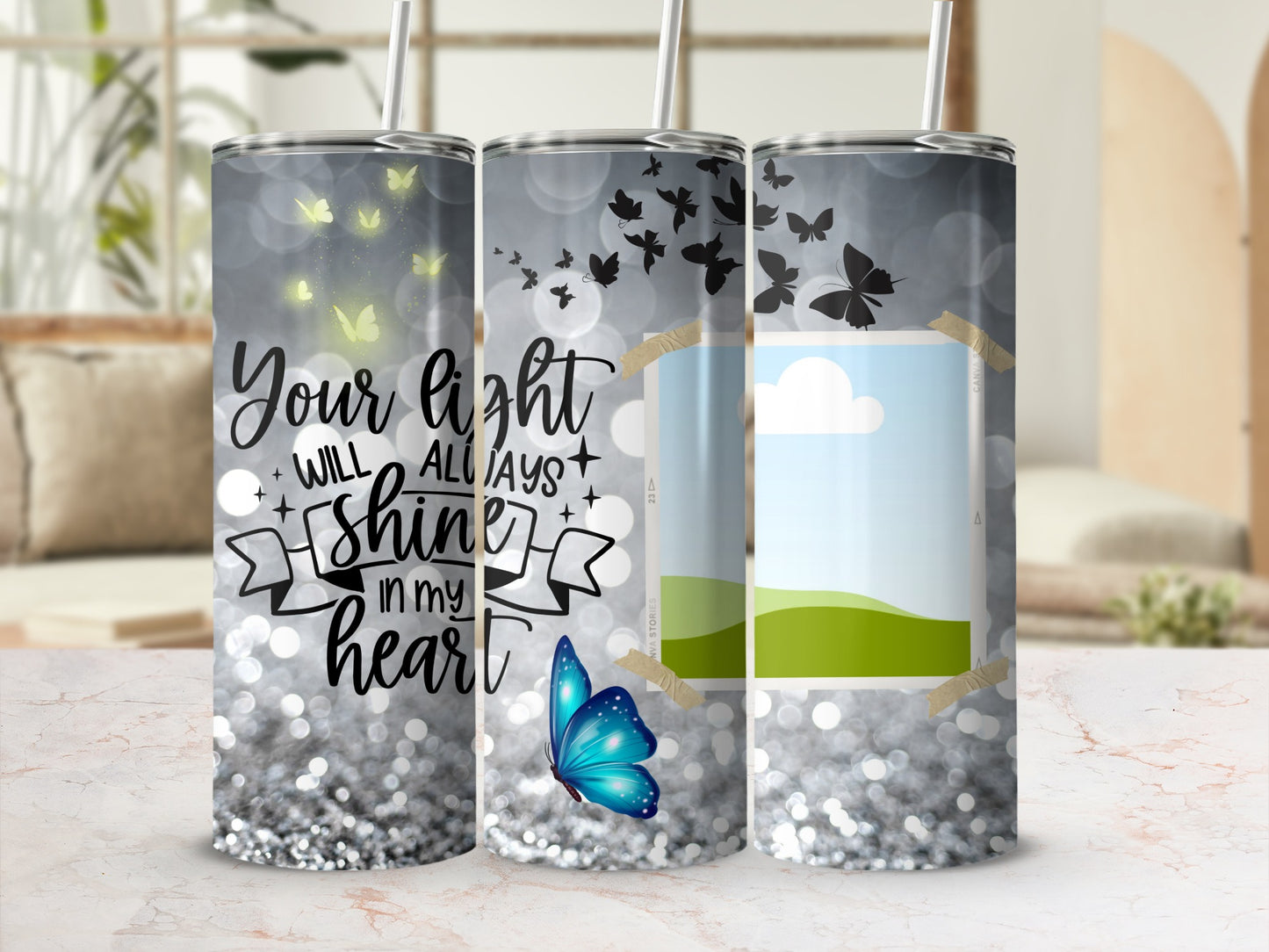 Tumbler with "Your light will always shine in my heart" and butterflies.