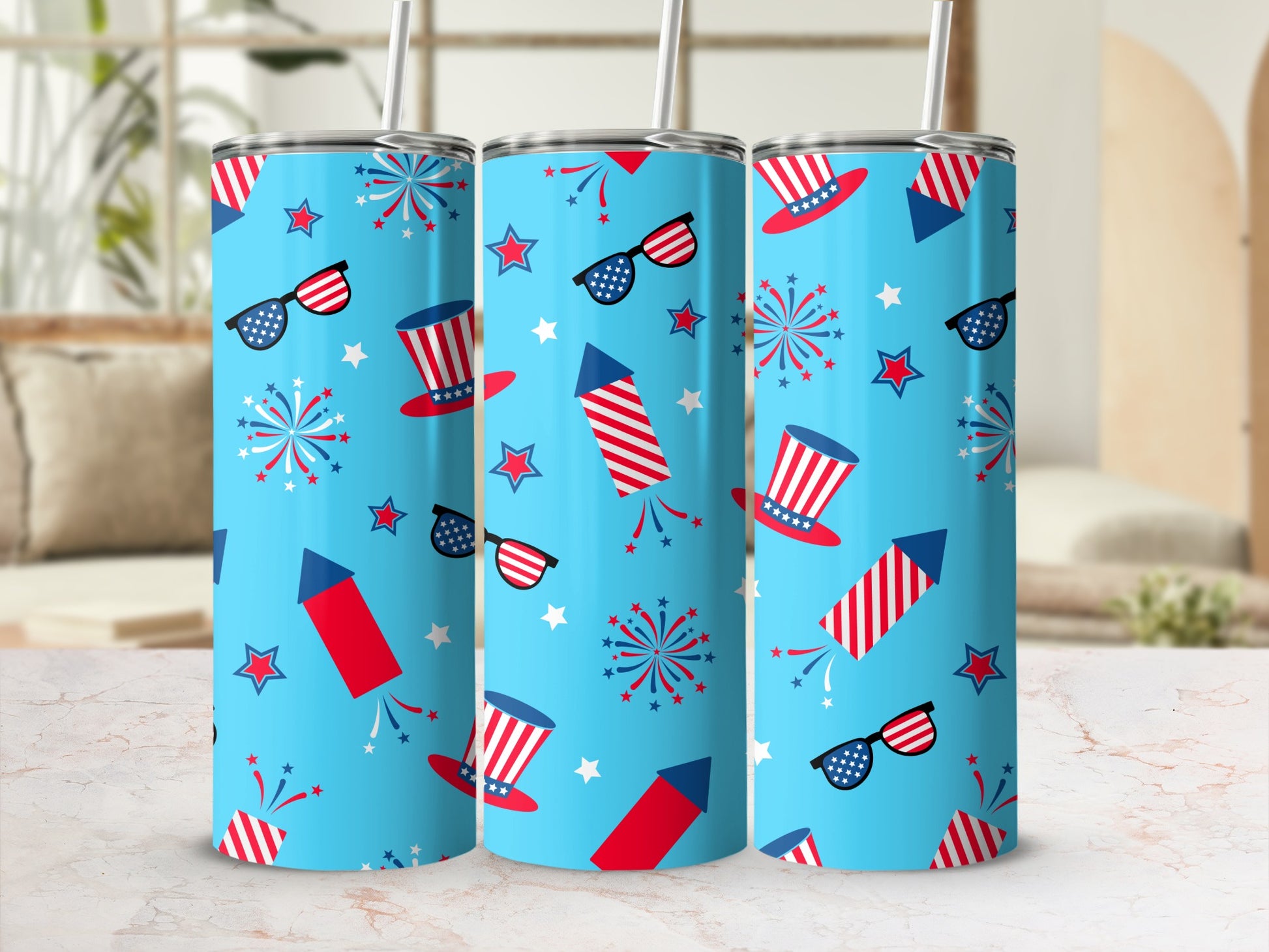 Blue tumbler with patriotic fireworks, stars, hats, and glasses designs.