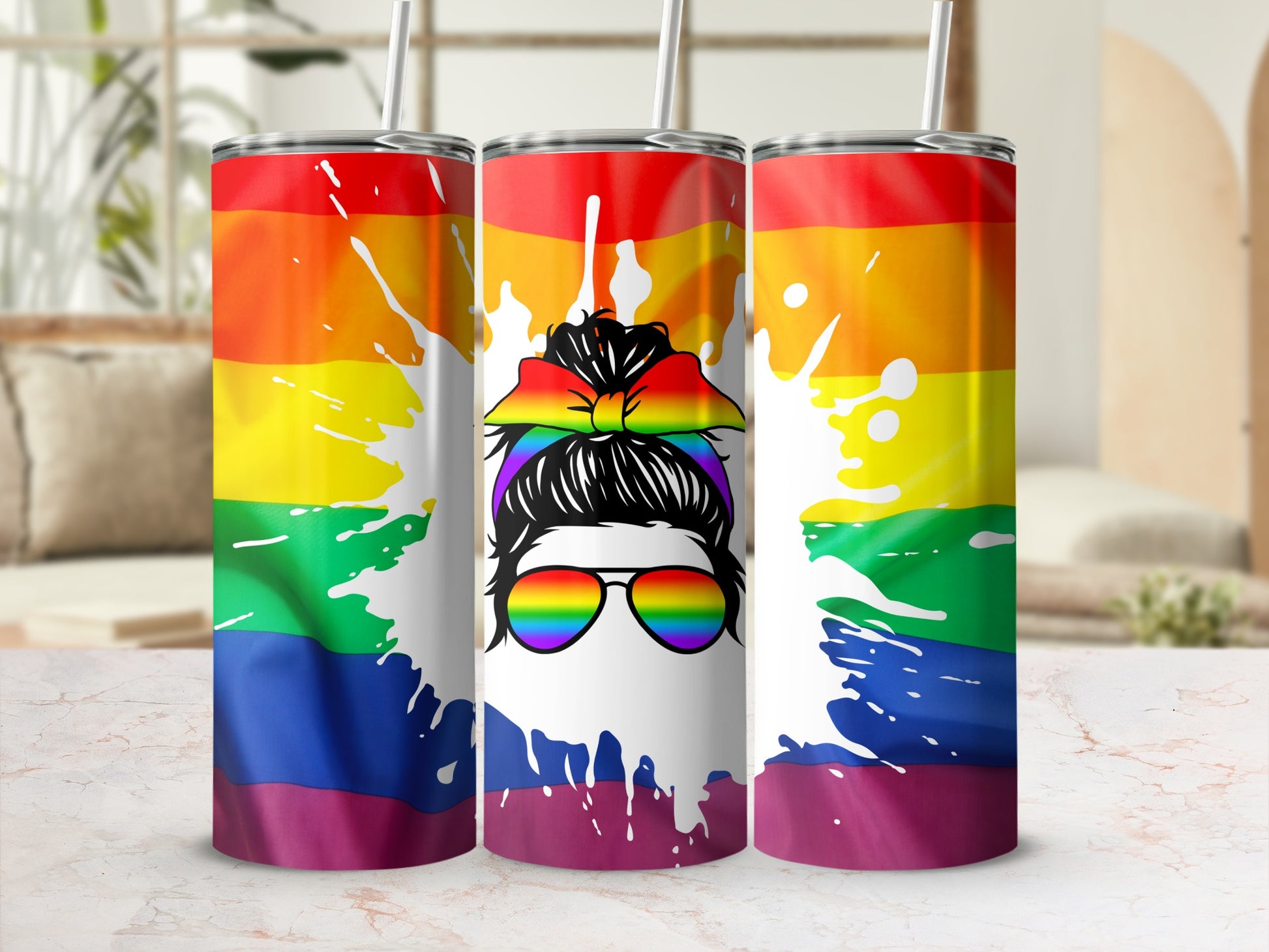 Rainbow tumbler with messy bun woman graphic and sunglasses.