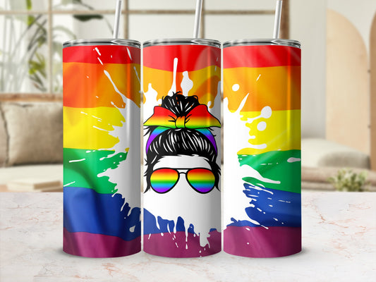 Rainbow tumbler with messy bun woman graphic and sunglasses.