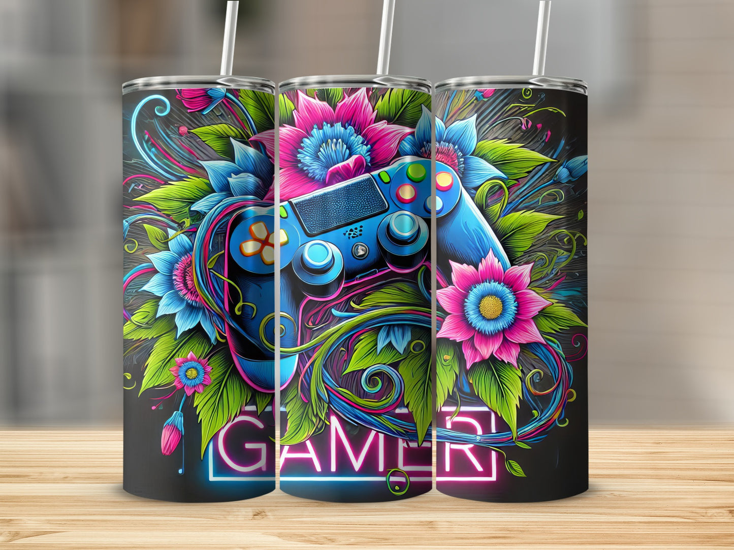 Three gaming tumblers with floral accents and "GAMER" text.