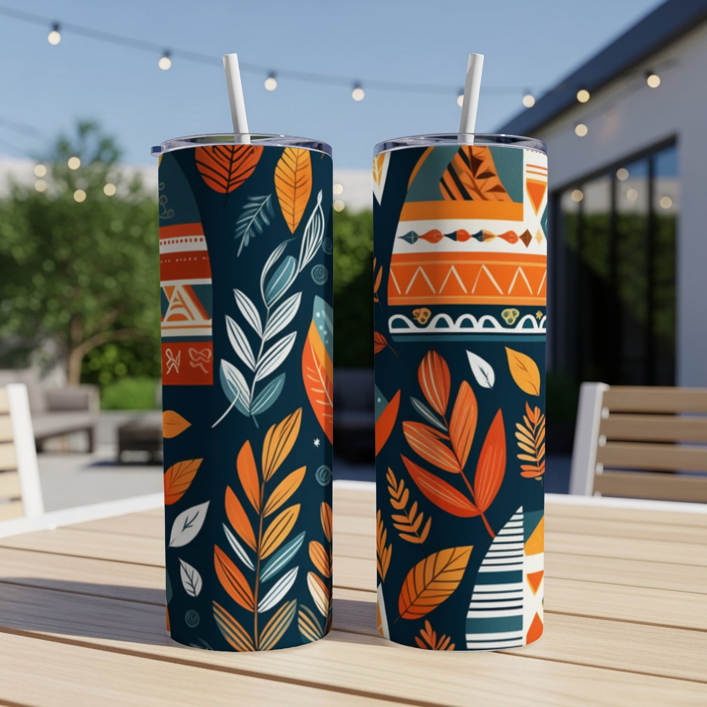 Two tumblers with orange and blue leaf and geometric patterns.
