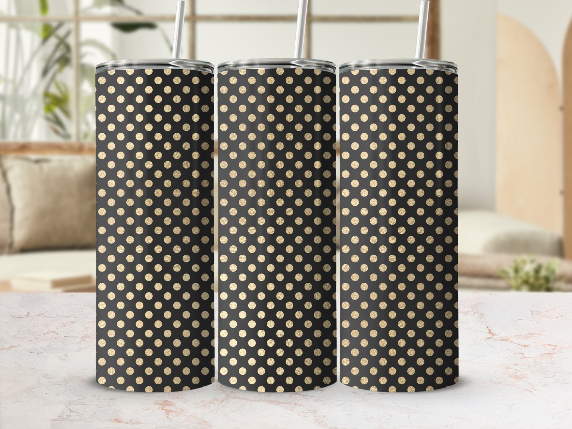 Three tumblers with a black background and scattered gold glitter polka dots.