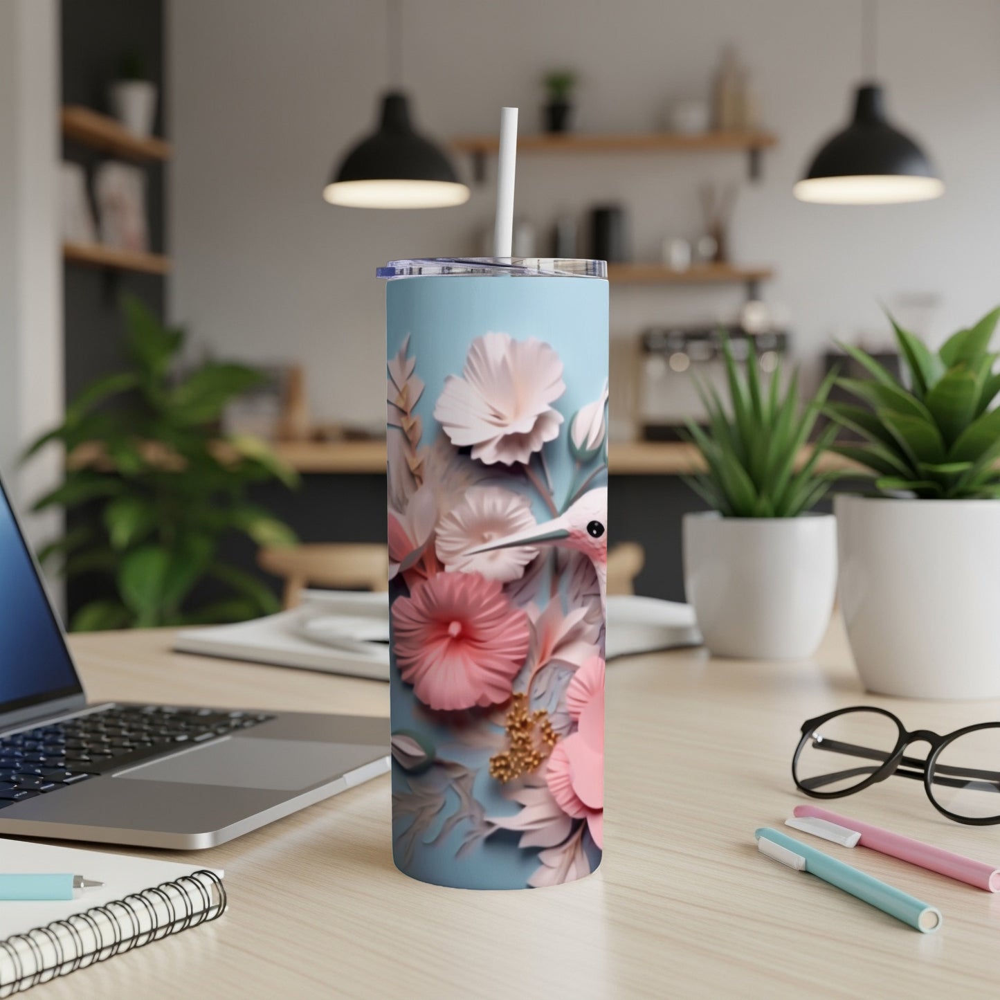 Light blue tumbler with pink flowers and a hummingbird design.