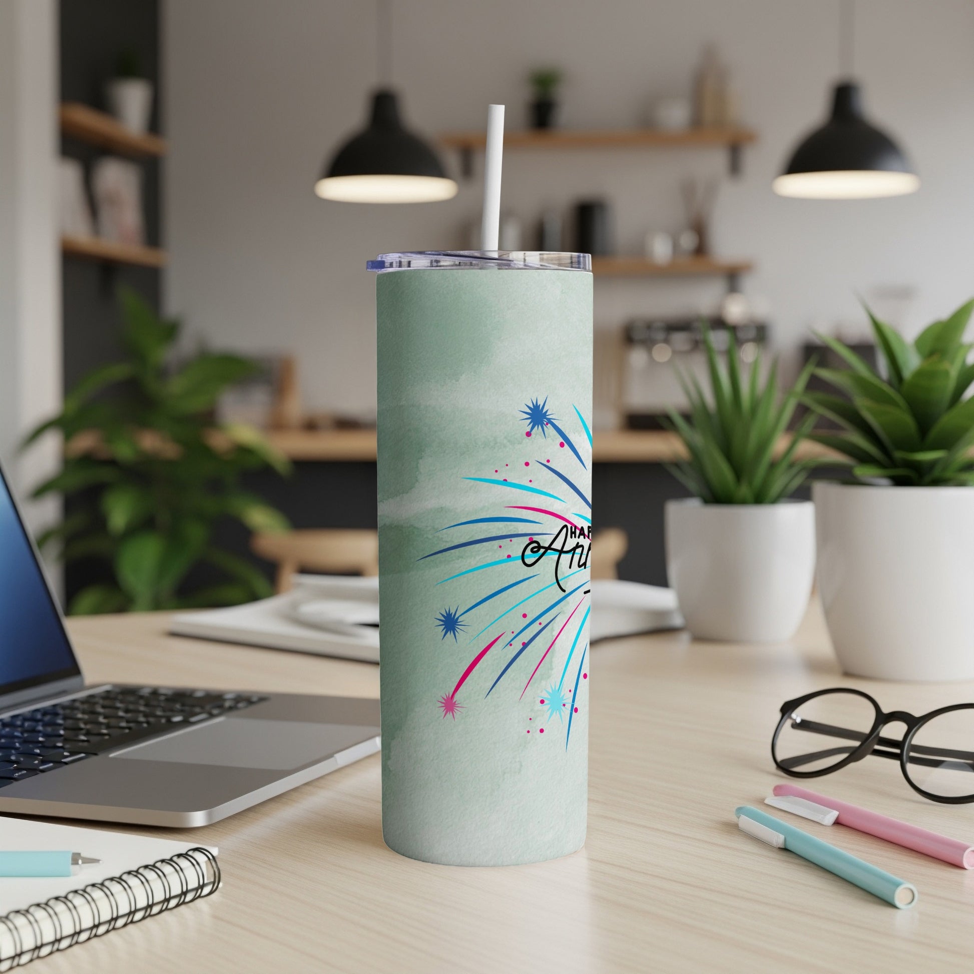 Mint green tumbler with fireworks design and "Happy Anniversary" text.