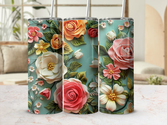 Floral design tumbler with roses and green leaves on a teal background.