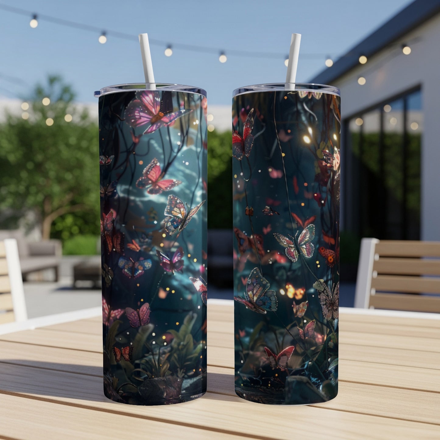 Two tumblers with a dark, magical forest scene filled with glowing butterflies.