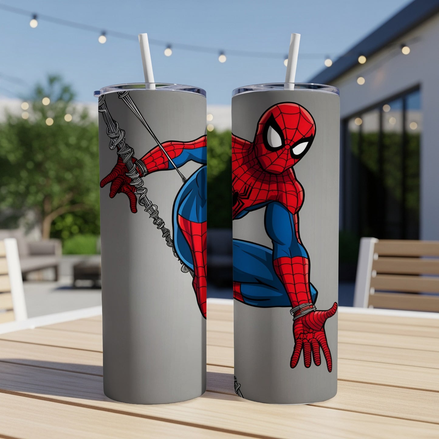 Two stainless steel tumblers featuring a graphic of Spider-Man in his classic costume.