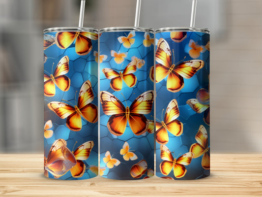 Three tumblers with a vibrant butterfly pattern on a blue background.