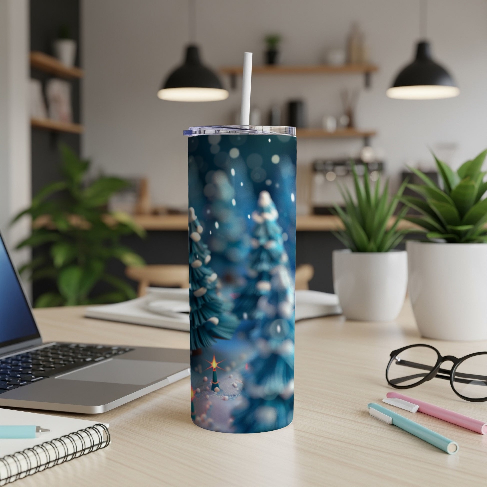 Blue and white speckled tumbler with blurry Christmas trees and bokeh lights.