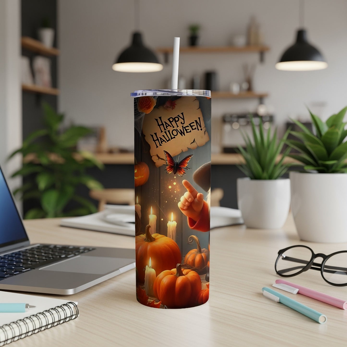 Tumbler with "Happy Halloween" text, pumpkins, candles, and a butterfly.