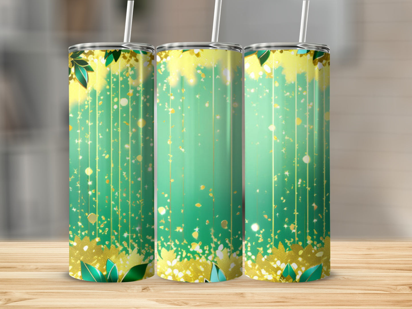 Three tumblers with a green, gold, and white abstract leafy gradient design.