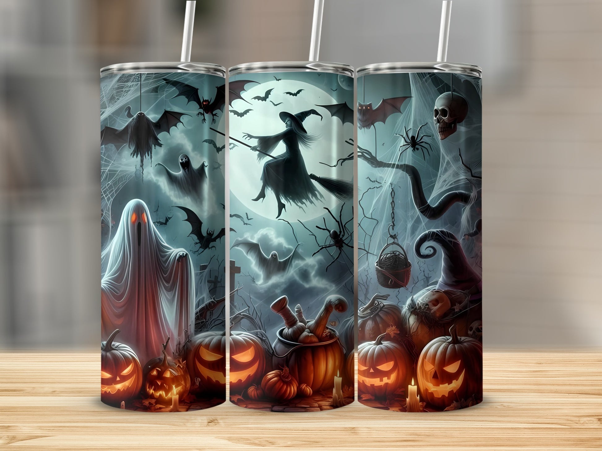 Halloween themed tumblers with ghosts, bats, witches, and jack-o'-lanterns.