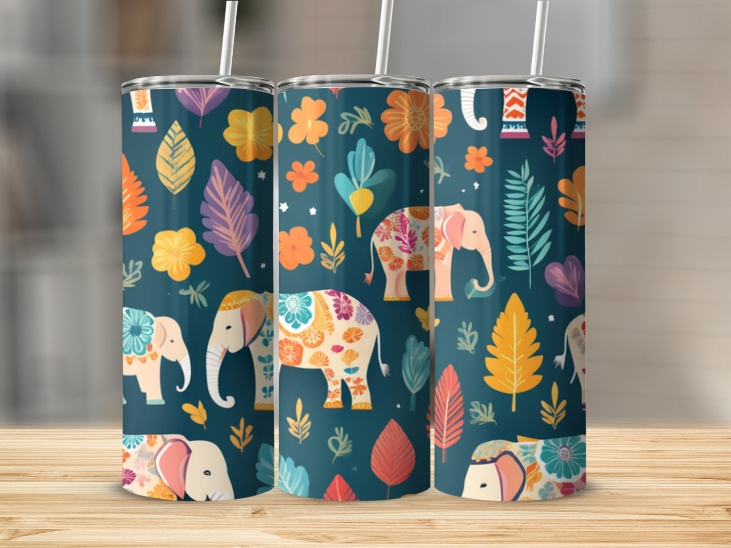Three tumblers with a dark blue background and a colorful floral elephant pattern.
