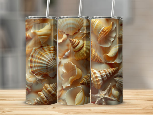 Three tumblers with a seashell and sand pattern.