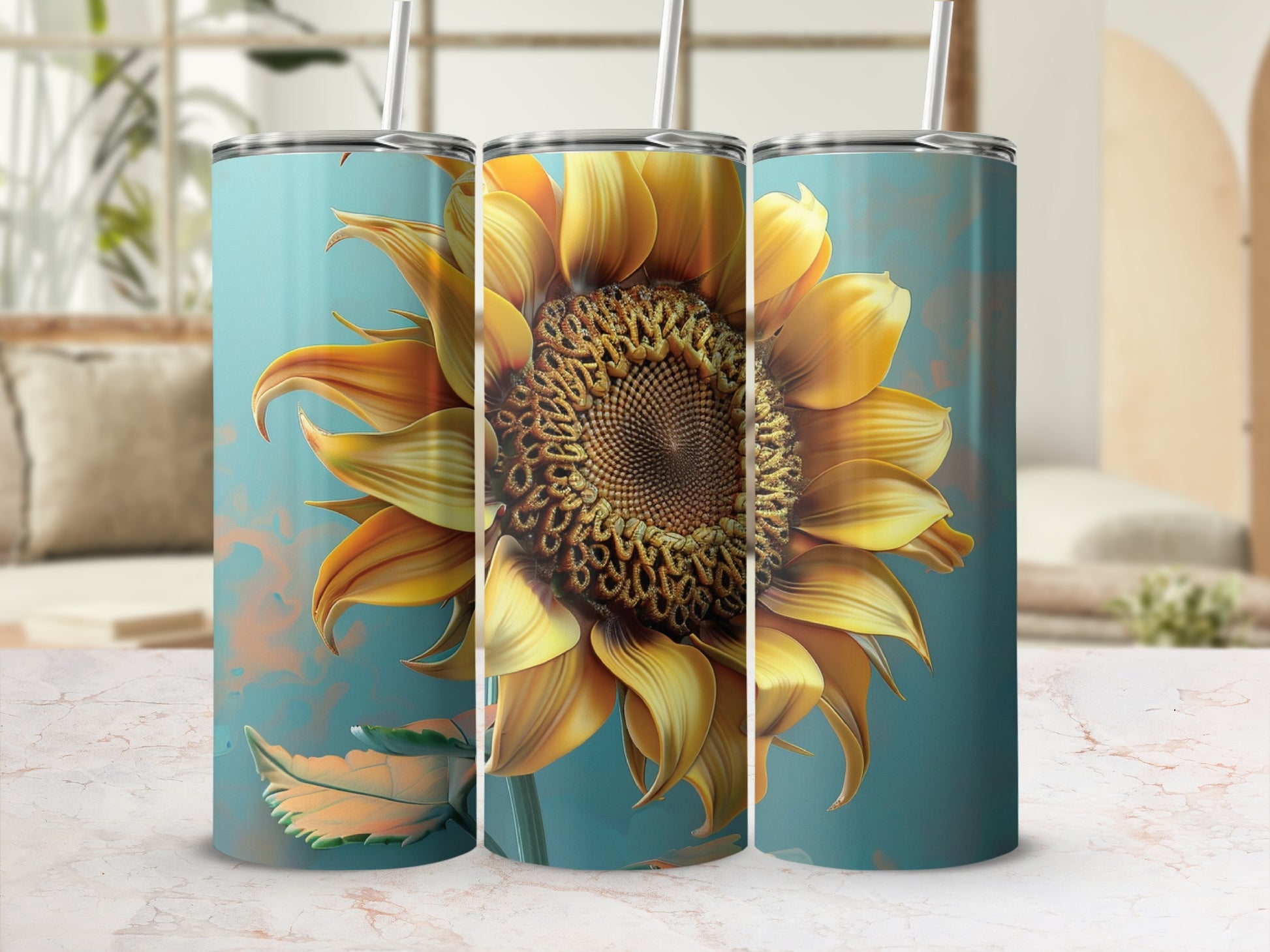 Three tall tumblers with a large sunflower design on a marble surface.
