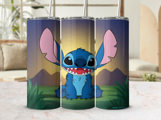 Stitch character on a blue tumbler with grass and sunset background.