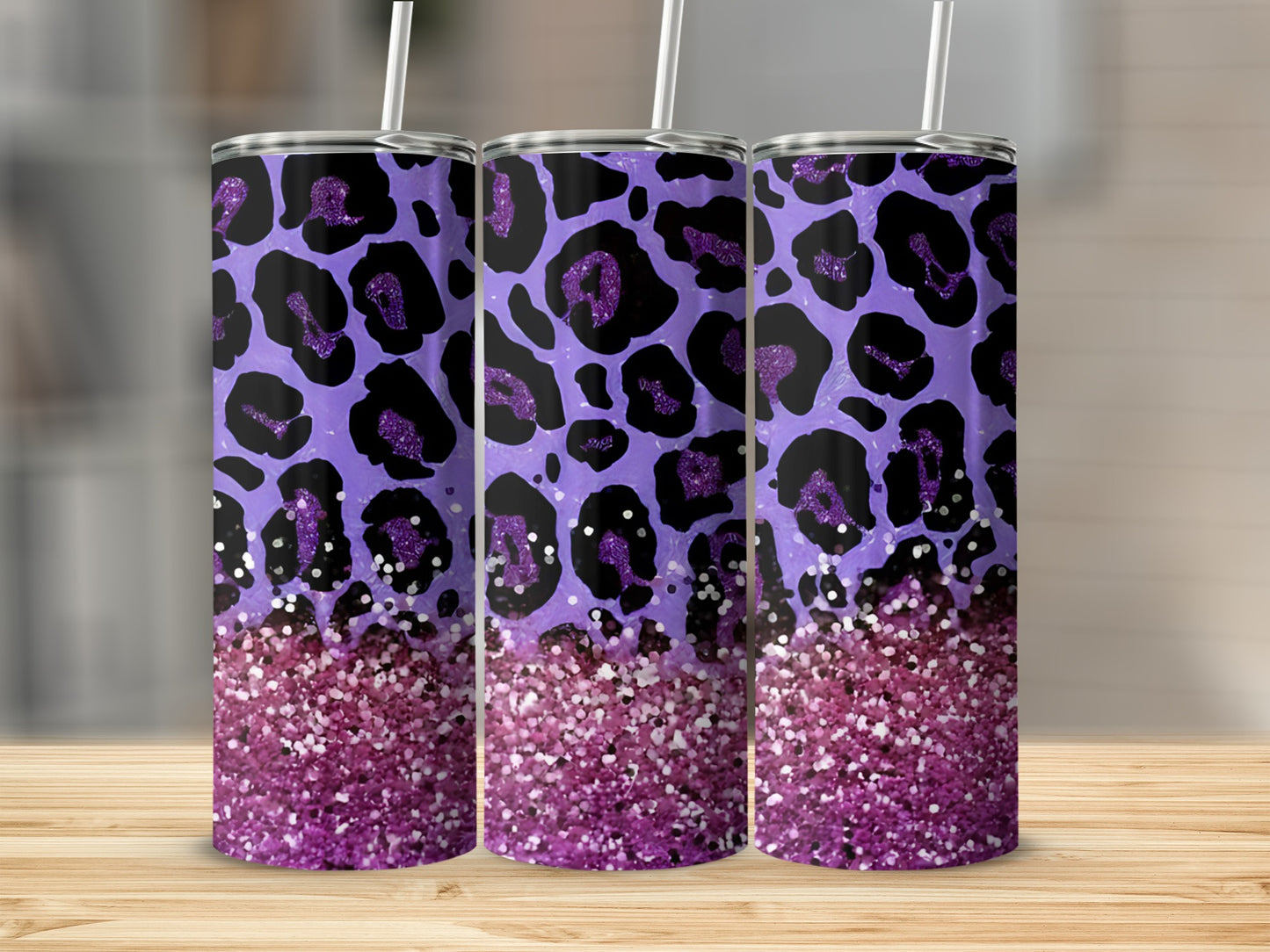 Purple and black leopard print tumbler with glitter bottom.