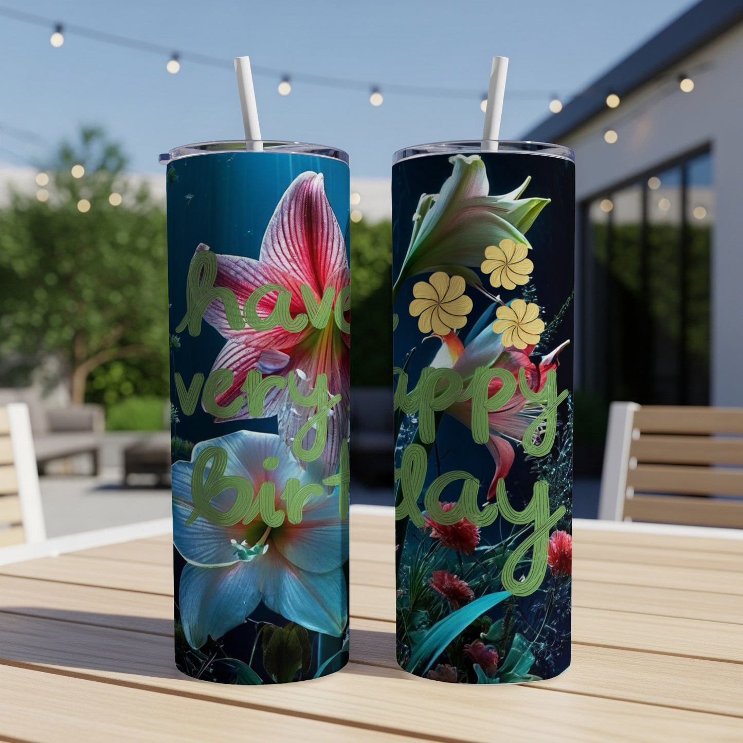 Two tumblers with "Happy Birthday" text and floral designs on a table.