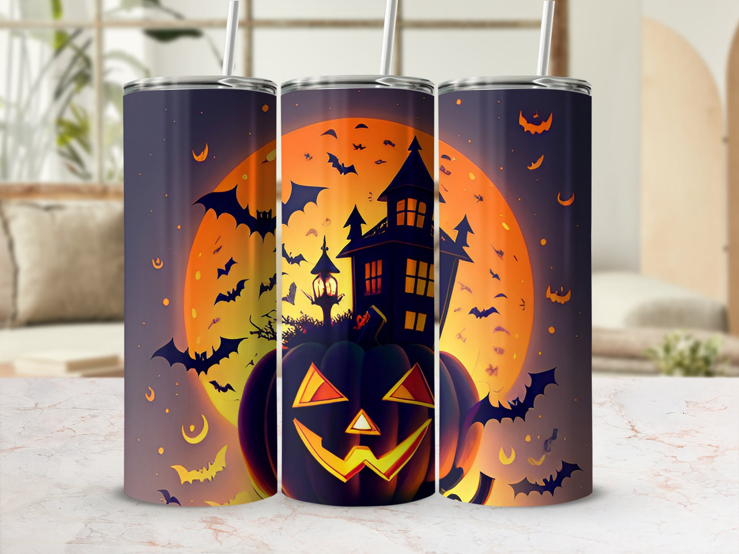 Halloween tumbler with jack-o-lantern, haunted house, bats, and moon.