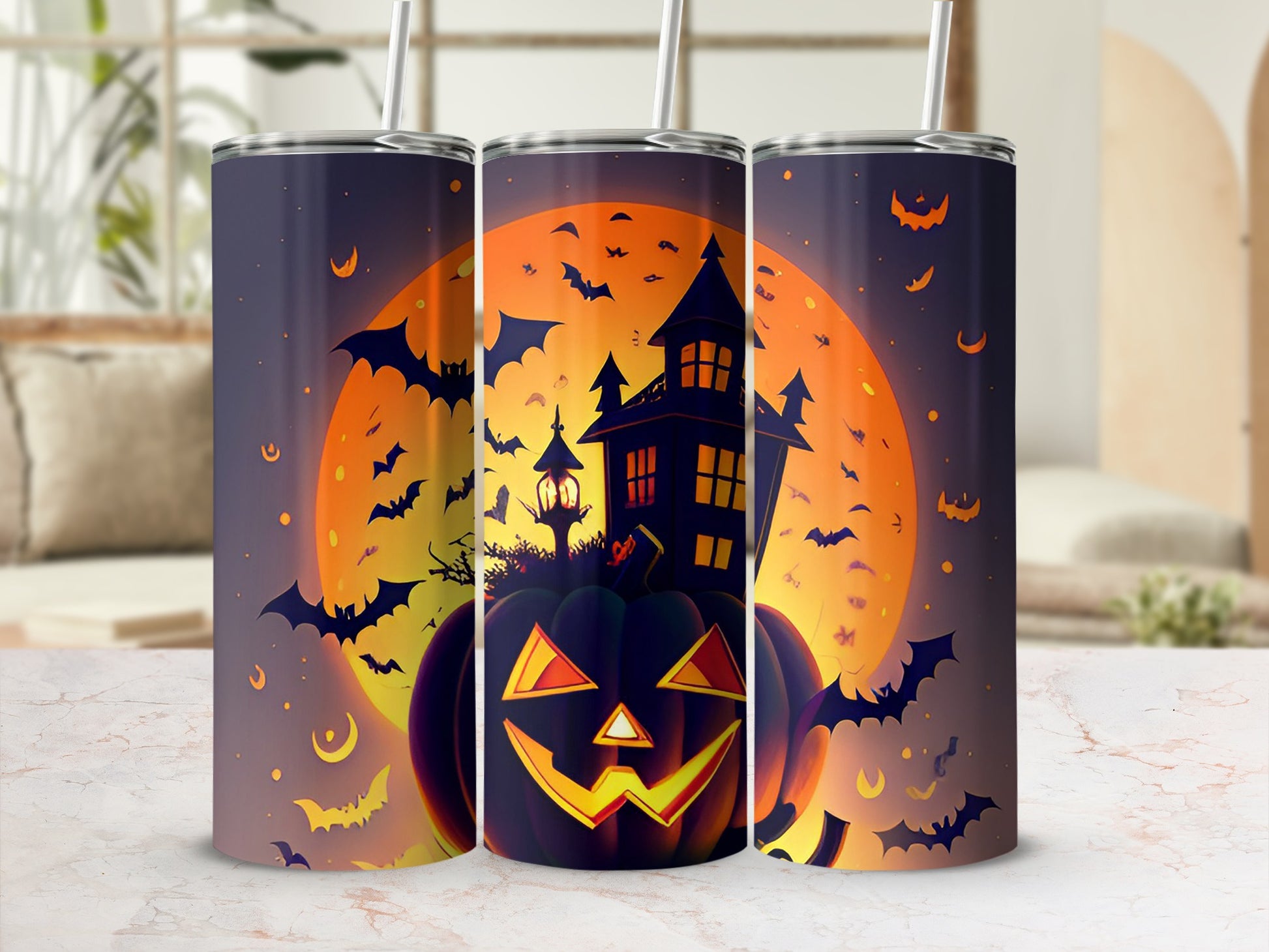 Halloween tumbler with jack-o-lantern, haunted house, bats, and moon.