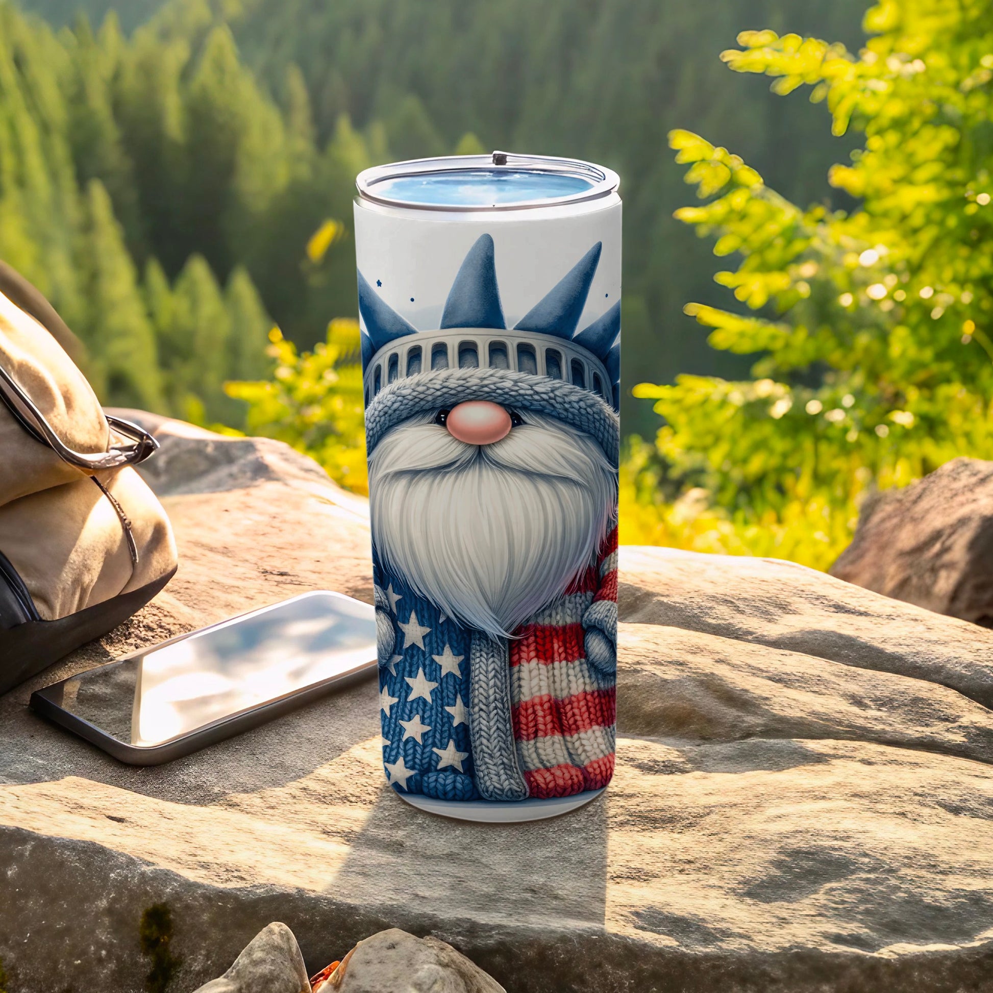 Gnome in Statue of Liberty costume with American flag details on a tumbler.
