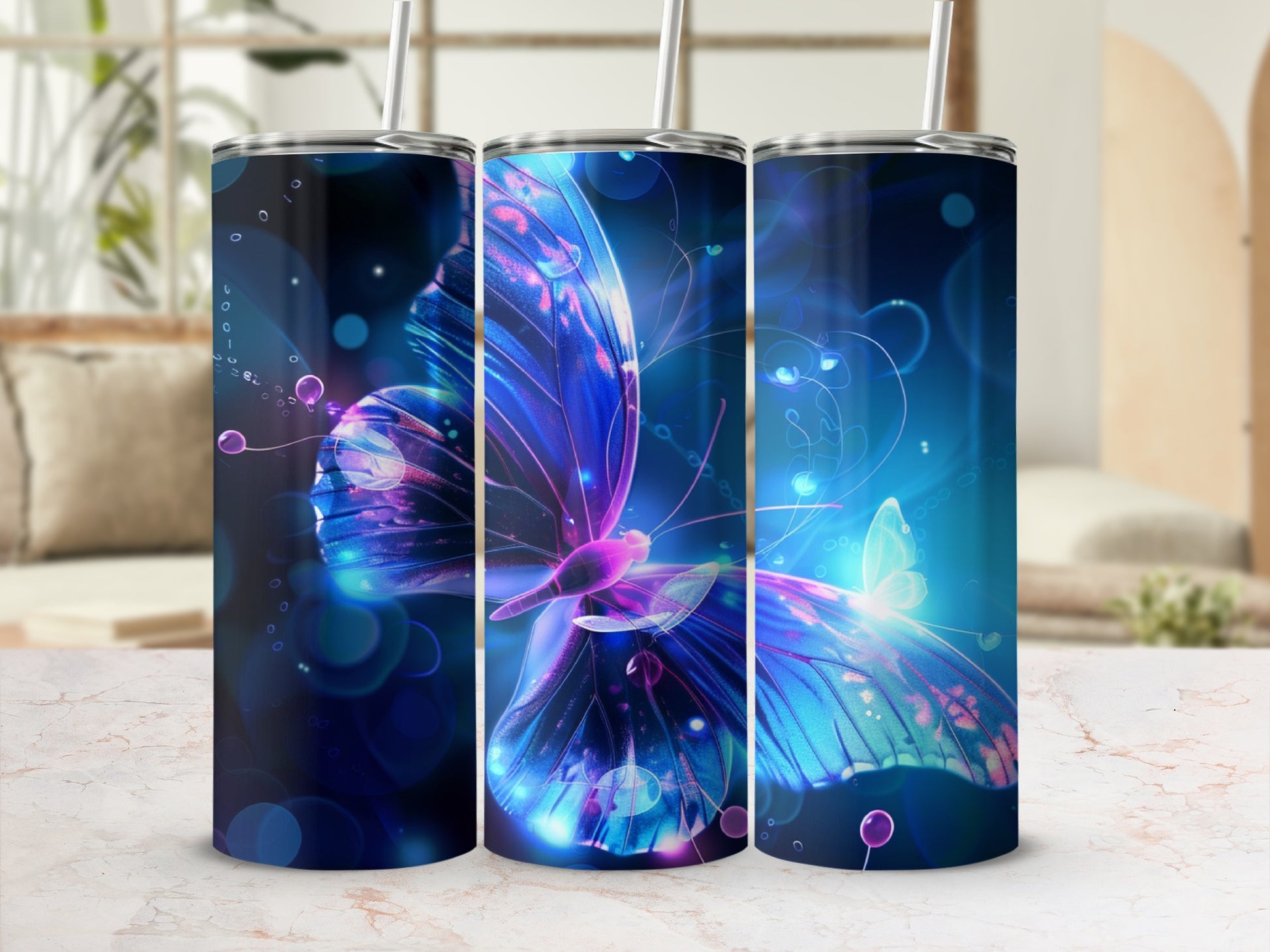 Three tumblers with a glowing blue and purple butterfly design.