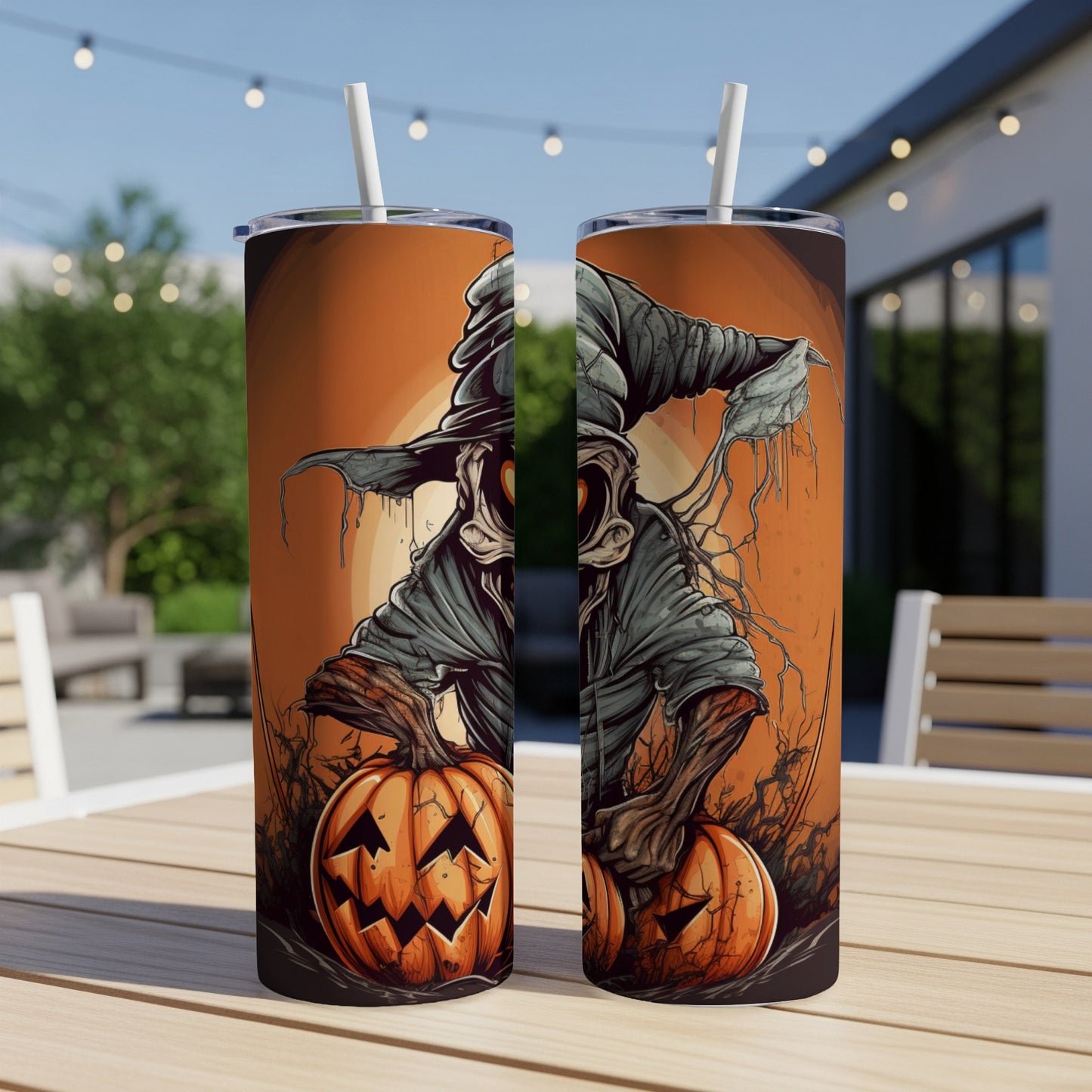 Two tumblers featuring a spooky scarecrow and pumpkins on an orange background.